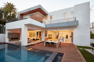Inspiration for a contemporary white two-story exterior home remodel in Los Angeles