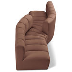 Meridian Furniture - Arc Vegan Leather Upholstered 4-Pc. Facing Modular Sectional, Cognac - Unleash modern opulence with the Arc Vegan Leather 4pc. Sectional. Crafted for the modern connoisseur, this Sectional injects an air of refined luxury into any space. Its sleek silhouette, upholstered in supple cognac vegan leather, exudes timeless sophistication while the deep channel tufting adds textural intrigue, further elevating the chair's visual appeal. The modular design makes it a versatile chameleon, effortlessly adapting to your evolving needs and preferences. Whether you envision it gracing a chic living room corner, basking in the glow of a bedroom window, or adding a touch of drama to a home office, the Arc seamlessly complements your unique interior aesthetic.