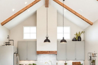 Example of a transitional dining room design in Denver