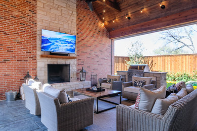 Inspiration for a large transitional beige one-story mixed siding exterior home remodel in Dallas with a mixed material roof