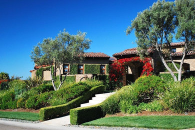 Tuscan home design photo in San Diego