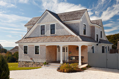 Design ideas for a traditional exterior in Boston with wood siding.