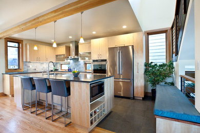 Inspiration for a mid-sized contemporary l-shaped vinyl floor eat-in kitchen remodel in Seattle with an undermount sink and an island
