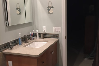 Example of a zen bathroom design in Detroit