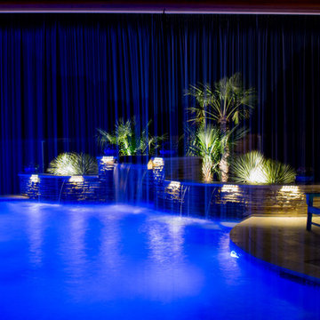 Transitional Curved Cool Pool with Amazing Water Features