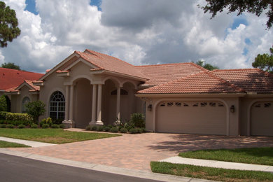 Island style exterior home photo in Tampa