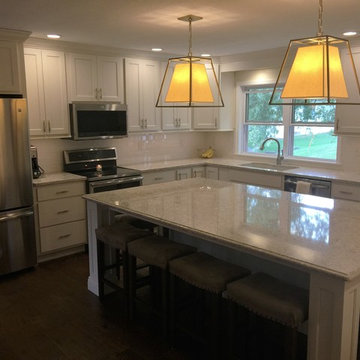 Davenport, IA- White Painted Kitchen With Gold Accents and Large Island