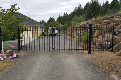 Redwood fence and rolling gate