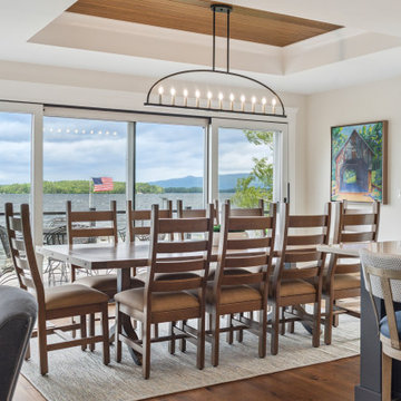 Lakeview Dining Space with Tray Ceiling and Sliding Glass Doors