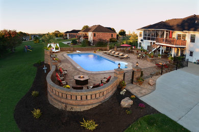 Backyard concrete paver pool fountain photo in Other