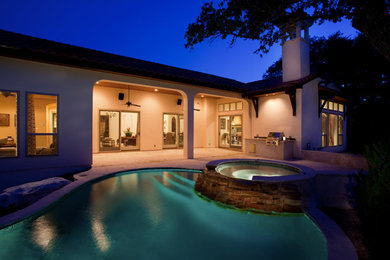 Inspiration for a traditional pool in Austin.
