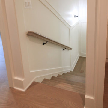 Project #93 | Captivating Staircase with Light Wood and Black Spindles