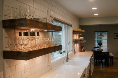 Inspiration for a mid-sized transitional home design remodel in Grand Rapids