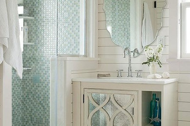 Small trendy blue tile and glass tile powder room photo in Phoenix with white cabinets, white walls, an undermount sink, quartz countertops and white countertops