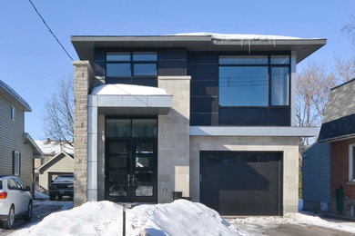 Example of a large transitional beige two-story mixed siding flat roof design in Ottawa