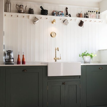 Rustic green kitchen with open plan shelving