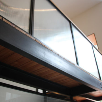Glass and black metal railings