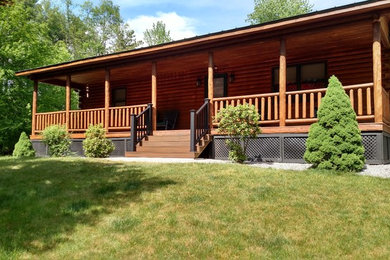 Mountain style front porch photo in Manchester