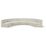 Meridian Furniture - Arc Vegan Leather Upholstered 8-Pc. Inward Curved Modular Sectional, Cream - Unleash modern opulence with the Arc Vegan Leather 8pc. Sectional. Crafted for the modern connoisseur, this Sectional injects an air of refined luxury into any space. Its sleek silhouette, upholstered in supple cream vegan leather, exudes timeless sophistication while the deep channel tufting adds textural intrigue, further elevating the chair's visual appeal. The modular design makes it a versatile chameleon, effortlessly adapting to your evolving needs and preferences. Whether you envision it gracing a chic living room corner, basking in the glow of a bedroom window, or adding a touch of drama to a home office, the Arc seamlessly complements your unique interior aesthetic.