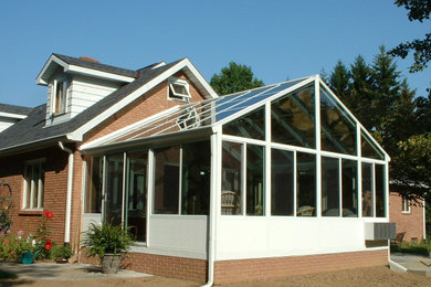Example of a classic sunroom design in Other