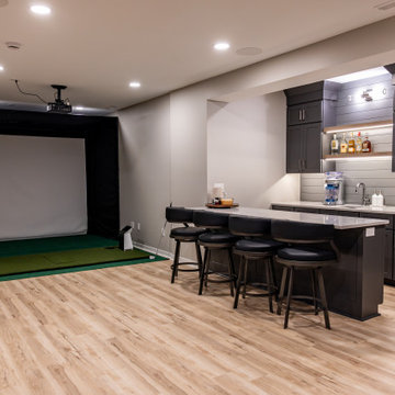 Shawnee, KS Basement Remodel with Custom Bar & Golf Simulator