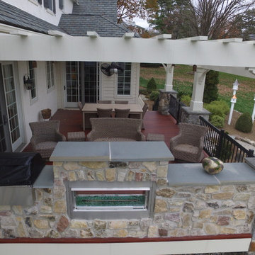 Zuri Deck with Cedar Pergola and Stone Fireplace with Grill