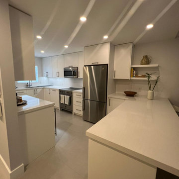 Transitional Kitchen Remodel Done in a Satin White Slim Shaker Door