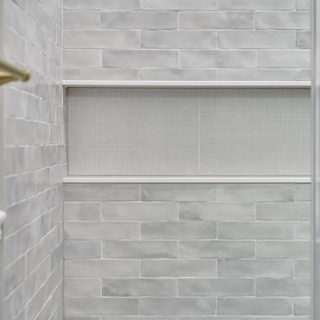 White Bathroom With Golden Finishes