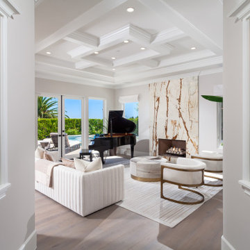 Formal Living Room with Quartzite Slab Fireplace & Geometric Coffered Ceiling –