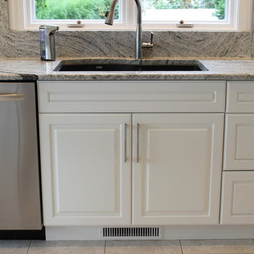 Geneseo, IL- Painted White Kitchen With Mirrored Cabinets and Full-Height Splash