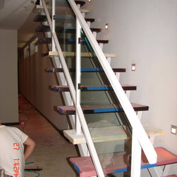 Steel stairs with glass panel - Products