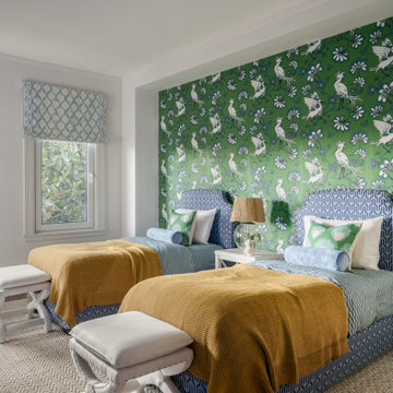 Playful Guest Bedroom with Green Bird & Floral Wallpaper and Twin Beds