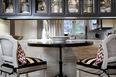Eclectic exposed beam dining room photo