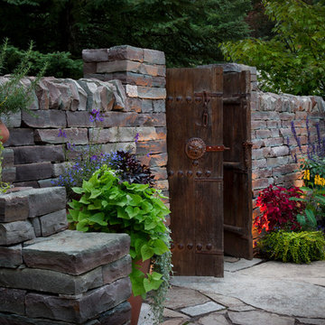 Stacked Stone Wall and Antique Wood Door
