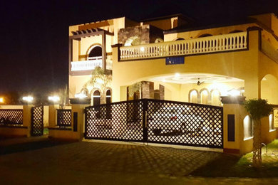 Tuscan exterior home photo in Other
