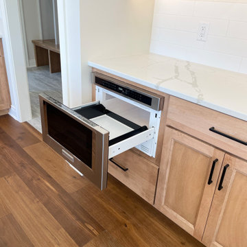 Ivory Painted and Maple Pecan Kitchen Design in Bettendorf, Iowa