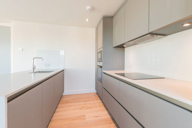 Example of a trendy kitchen design in London