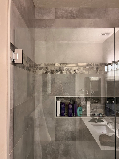 Glass shower door keeps slipping "out of square"?