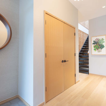 Chicago Contemporary Entryway Featuring Custom Millwork, White Oak Flooring & De