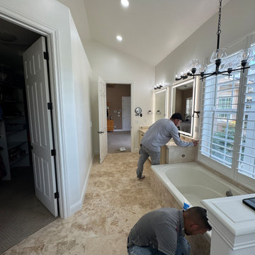 Curd-less walk-in shower; heated floors in bathroom + shower+bench LED