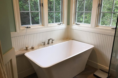 Freestanding bathtub - mid-sized contemporary master freestanding bathtub idea in DC Metro with gray walls
