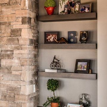 Floating Shelves Flank Fireplace