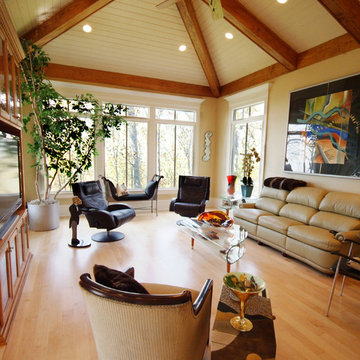 Family Room with beam and plan vaulted ceiling
