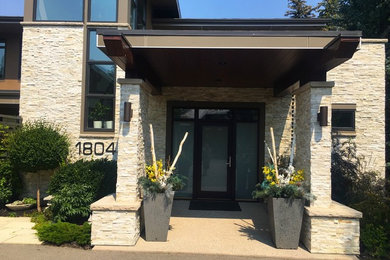 Inspiration for a large contemporary entryway remodel in Calgary
