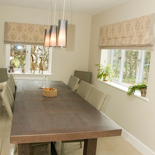 Cottage chic home design photo in Surrey