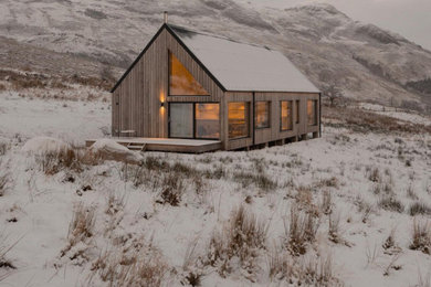 Scandinavian exterior home idea in Other