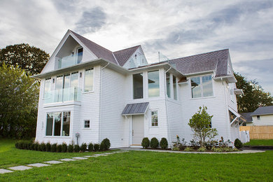 Beach style home design photo in New York