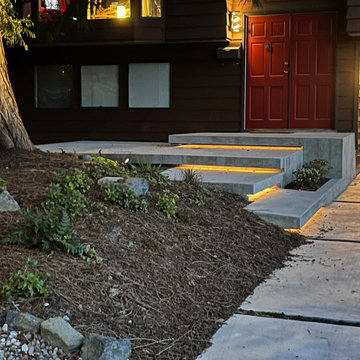 Wider evening view from the driveway of the steps