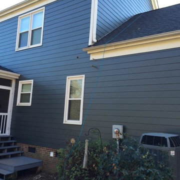 Charlotte, NC, upscale vinyl siding replacement by Belk Builders.
