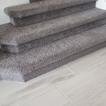Carpeted Stairway Transition to Wood Look Tile